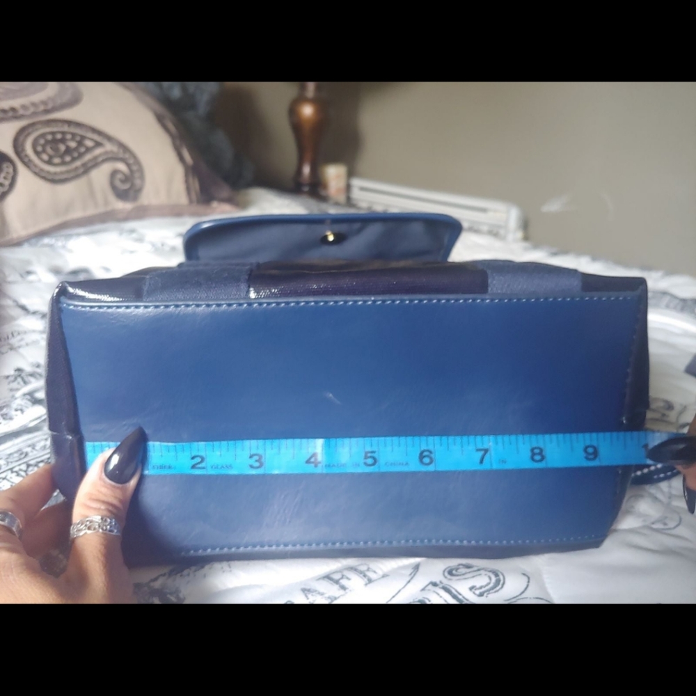 New with tag price $128.backpack - Picture 10 of 12